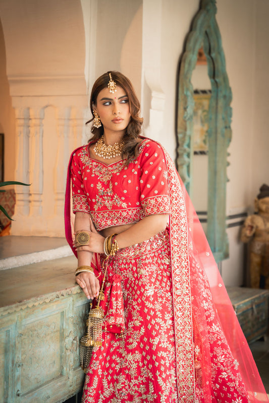 Rani Raw Silk Lehenga Set And Net Dupatta With Readymade Blouse