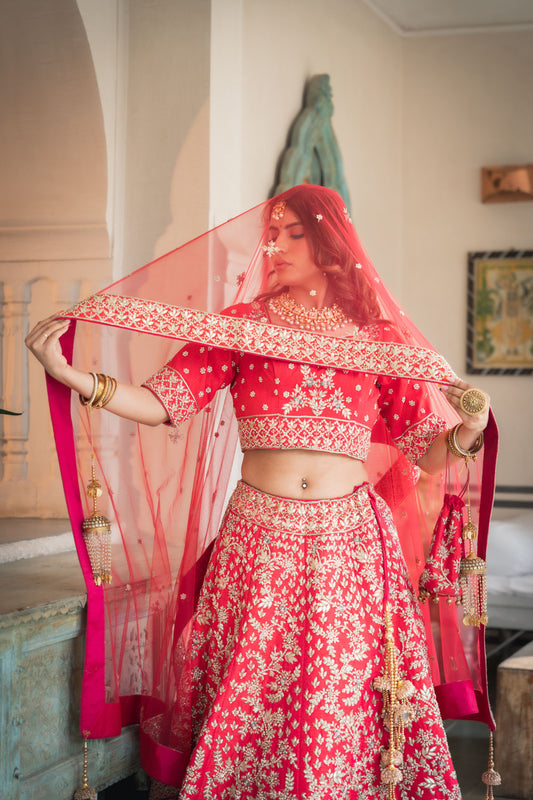 Rani Raw Silk Lehenga Set And Net Dupatta With Readymade Blouse