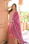 Glow Diffrent Gajari Shimmer Tissue Lehenga Set And Georgette Dupatta With Readymade Blouse