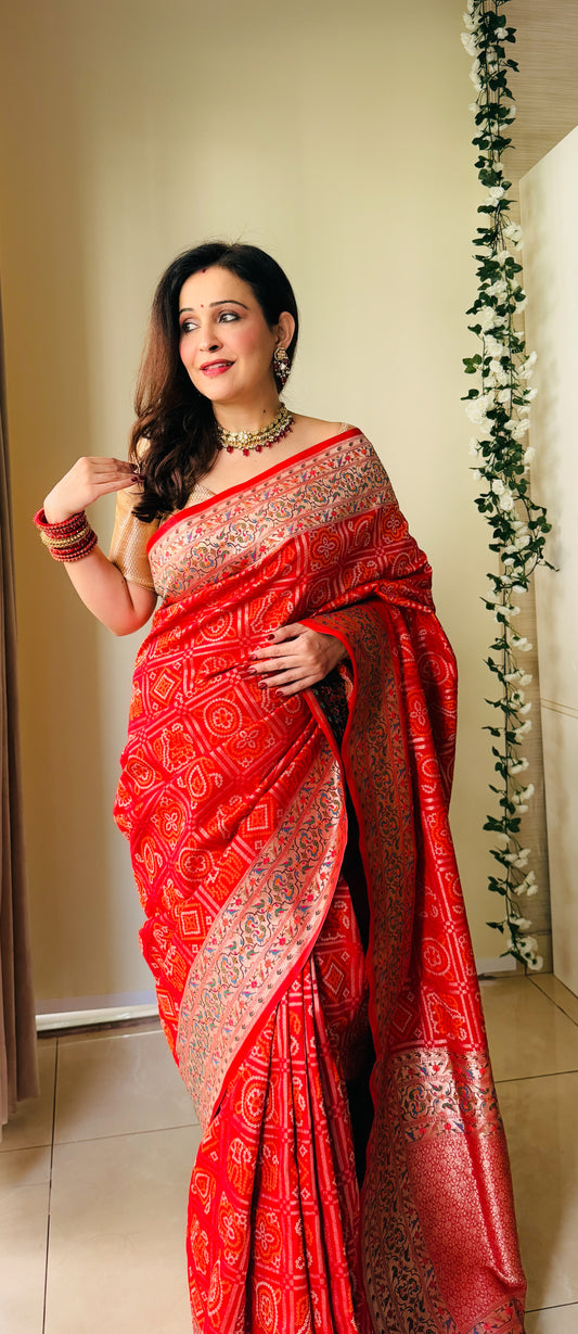 Grace Redefined Red Bandhani Gharchola Zari Border Banarasi Silk Saree With Unstitched Blouse (Ft:-Anjan Prasad)