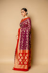 Wine Banarasi Woven Zari Chinon Saree With Unstitched Blouse