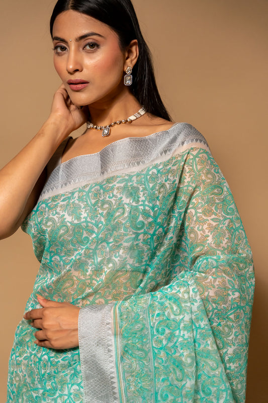 Off White Tea Green Cotton Floral Printed Saree With Unstitched Blouse