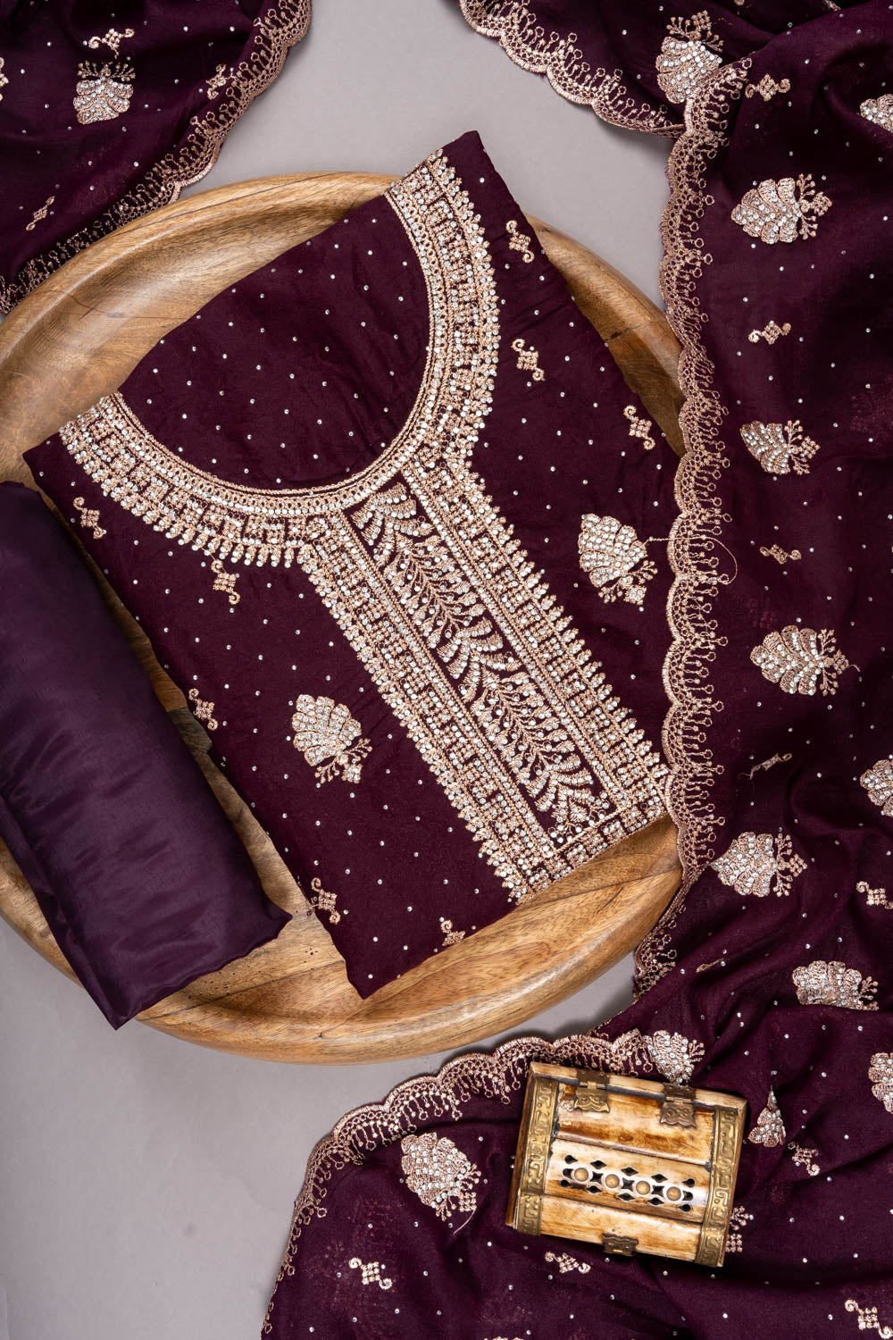 Garnet Georgette Unstitched Suit And Dupatta With Swarovski Work