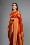 Rust Woven Zari Banarasi Silk Saree With Unstitched Blouse