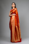 Rust Woven Zari Banarasi Silk Saree With Unstitched Blouse