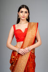 Rust Woven Zari Banarasi Silk Saree With Unstitched Blouse