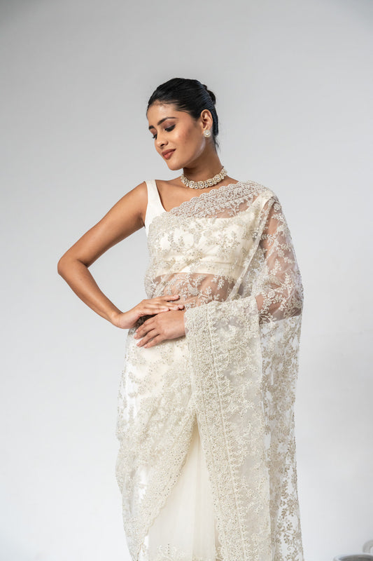 Off White Net Embroidered Saree With Unstitched Blouse