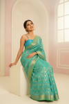 Royal Heritage Tea Green Banarasi Silk Saree With Unstitched Blouse