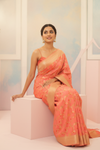Graceful Flow Peach Banarasi Silk Saree With Unstitched Blouse