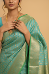 Royal Heritage Tea Green Banarasi Silk Saree With Unstitched Blouse