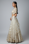 White Banarasi Silk Lehenga Set And Net Dupatta With Readymade Blouse