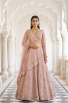 Blush Elegance Peach Net Lehenga Set And Net Dupatta With Readymade Blouse