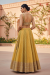 Mango Gold Tissue Lehenga Set And Net Dupatta With Readymade Blouse