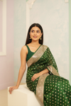 Regal Charm Bottle Green Banarasi Silk Saree With Unstitched Blouse