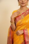Shine Bright In Mango Gold Banarasi Silk Saree With Unstitched Blouse
