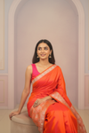 Spark The Difference In Orange Banarasi Silk Saree With Unstitched Blouse
