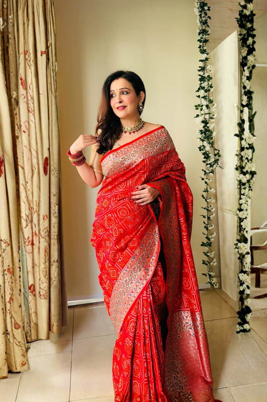 Grace Redefined Red Bandhani Gharchola Zari Border Banarasi Silk Saree With Unstitched Blouse (Ft:-Anjan Prasad)